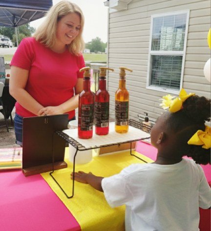 Legendary Lemonades stand interaction at an outdoor event