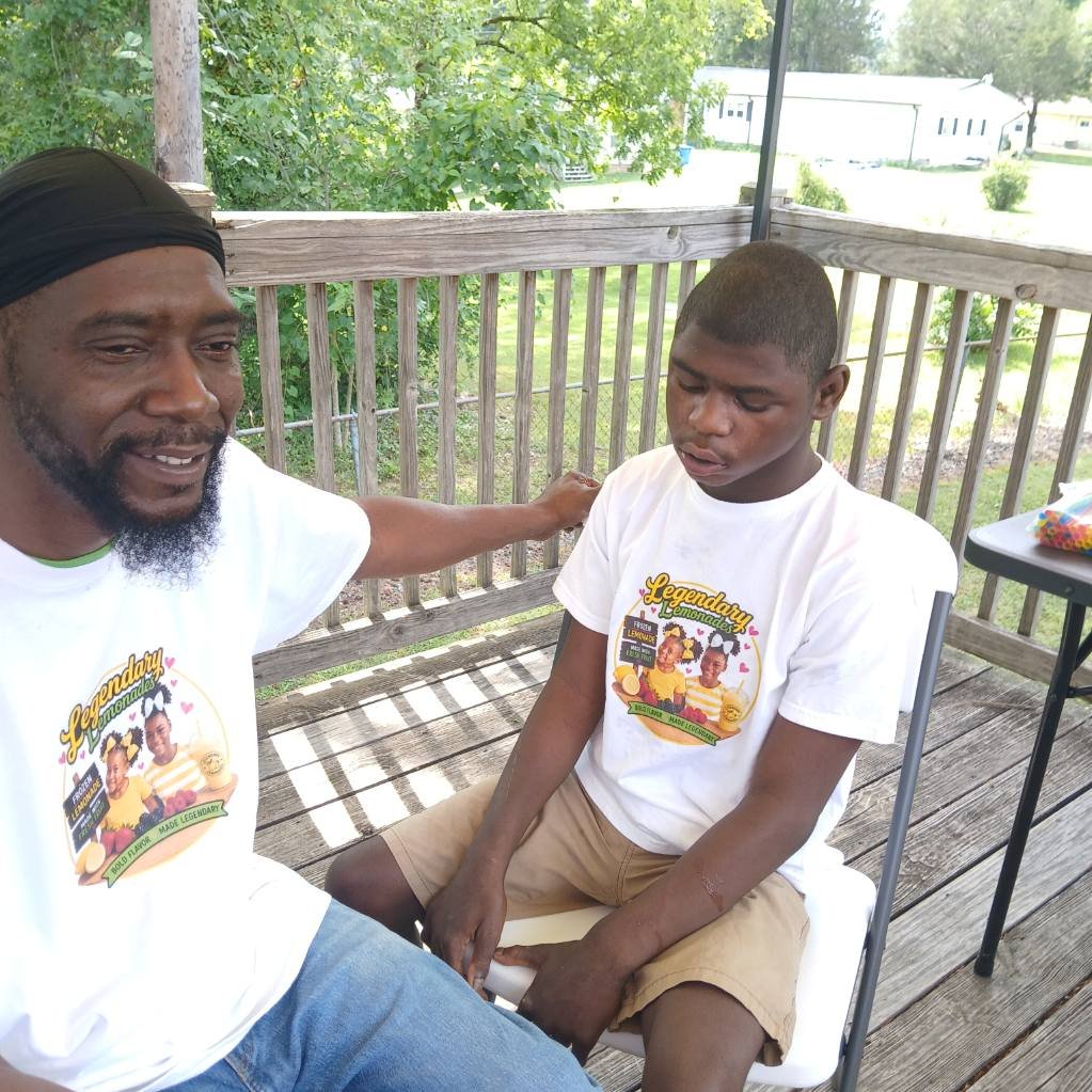 Family members wearing Legendary Lemonades shirts together