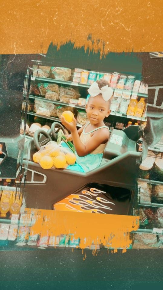 One of the sisters holding a lemon